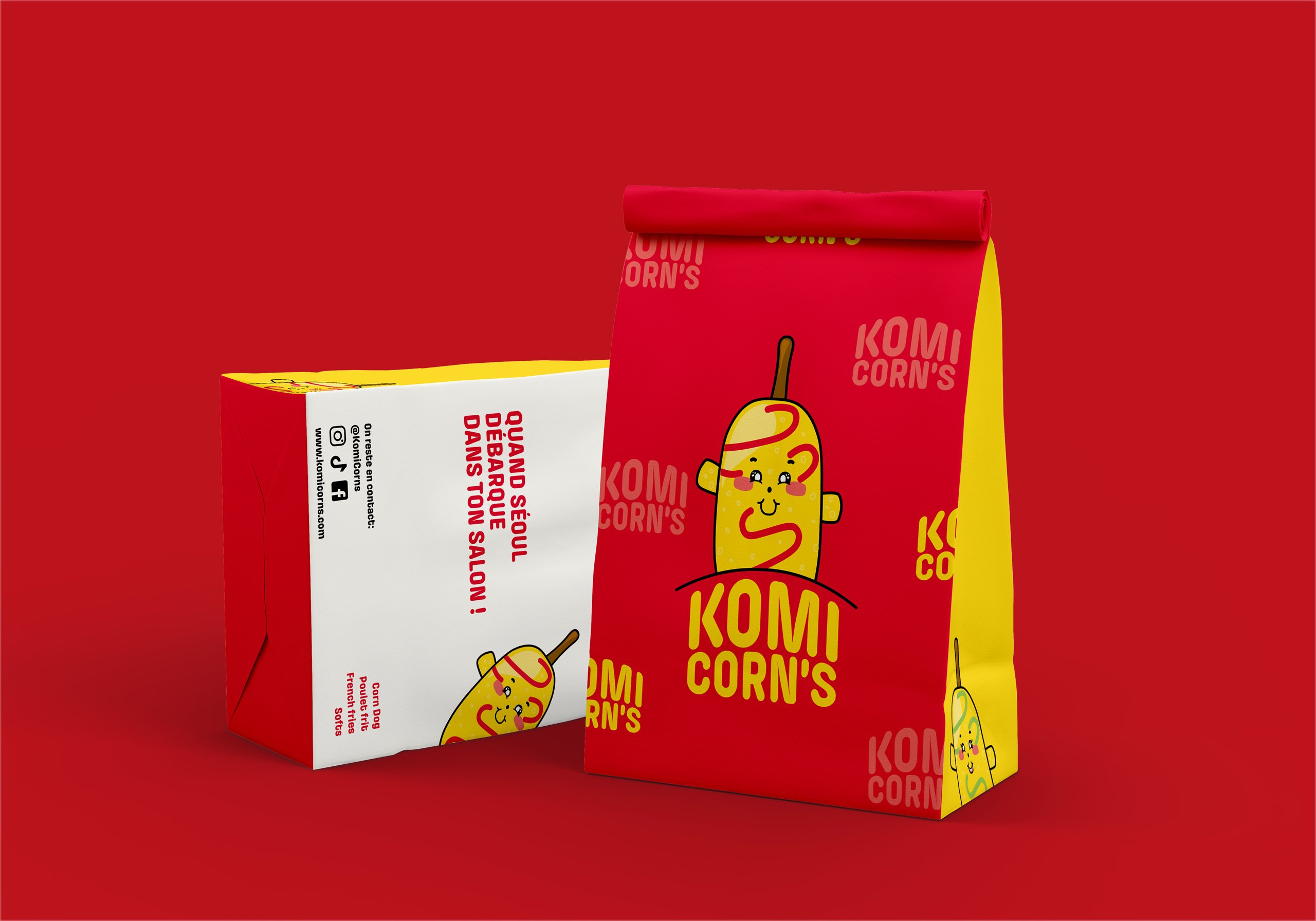 Komi Corn's — sacs à emporter sur fond rouge