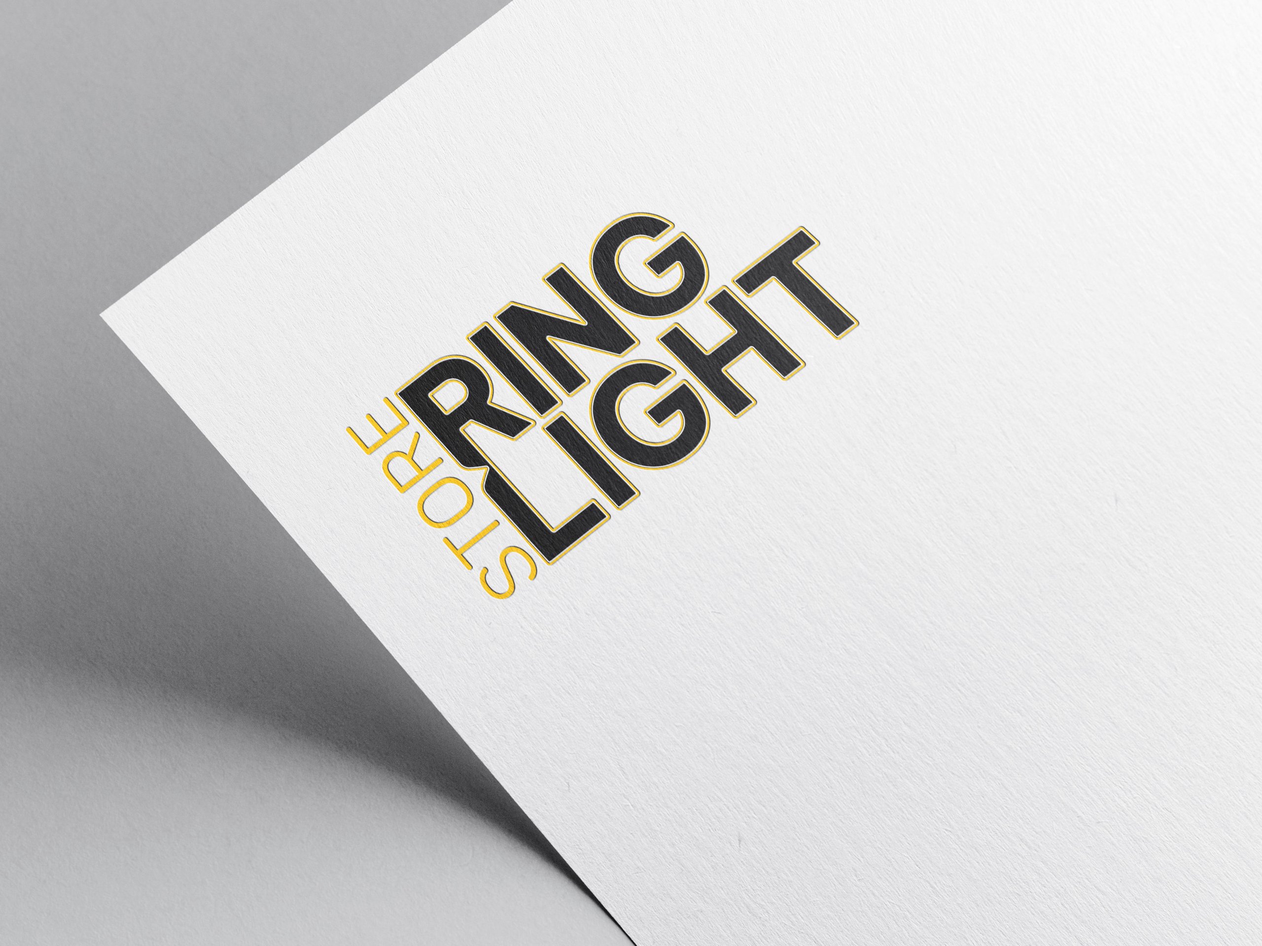 Ring Light Store — logo imprimé sur une feuille blanche